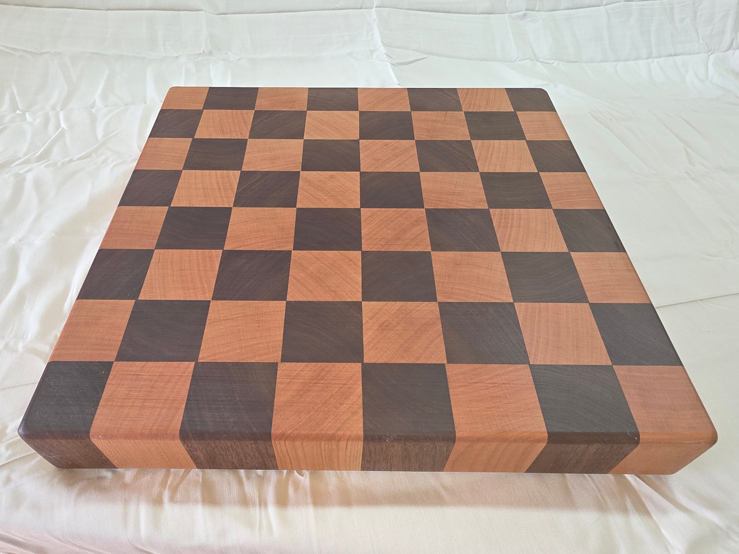 Handmade black walnut cherry end grain cutting board