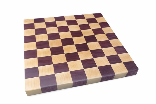 End grain cutting board made from Purpleheart and Maple hardwoods, featuring a high‑contrast checker pattern and polished food‑safe finish