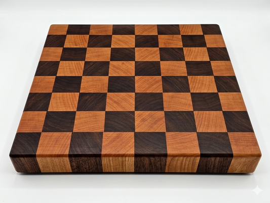 2-inch thick handmade end grain wood cutting board featuring a precise black walnut and cherry checkered butcher block pattern, displayed on a clean white background